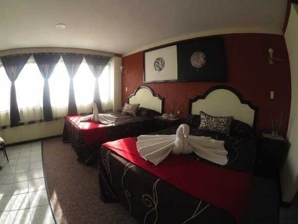 Imagen de la habitación del Hotel 1904. Foto 2