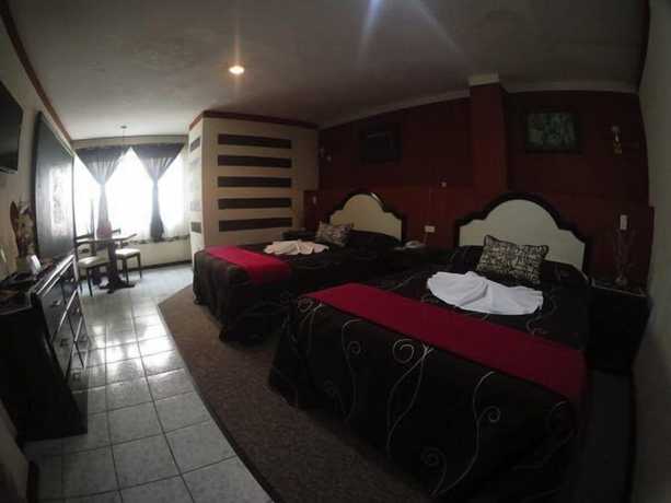 Imagen de la habitación del Hotel 1904. Foto 4