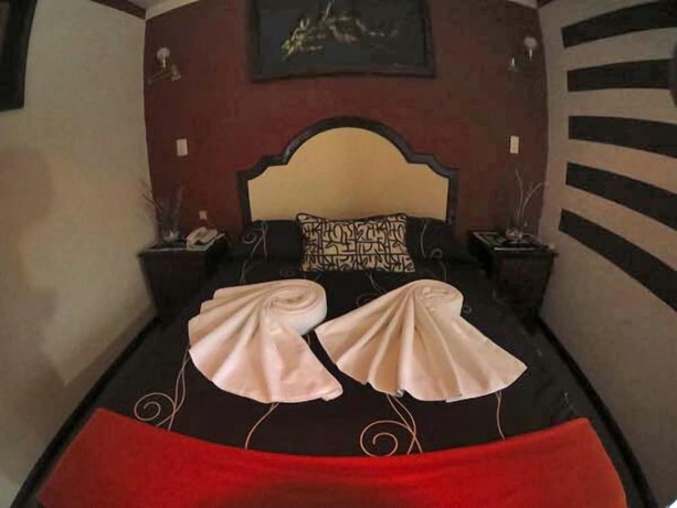 Imagen de la habitación del Hotel 1904. Foto 6