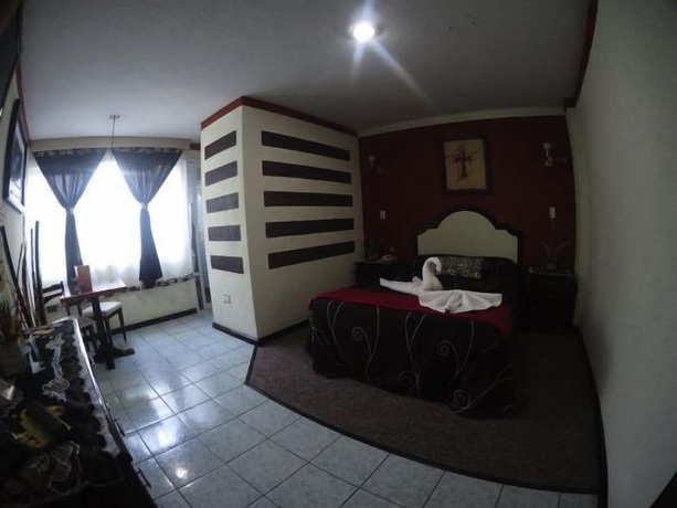 Imagen de la habitación del Hotel 1904. Foto 10