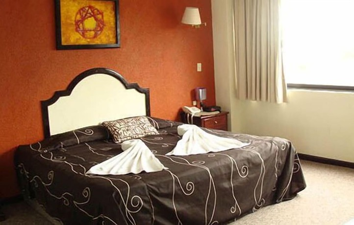 Imagen de la habitación del Hotel 1904. Foto 11