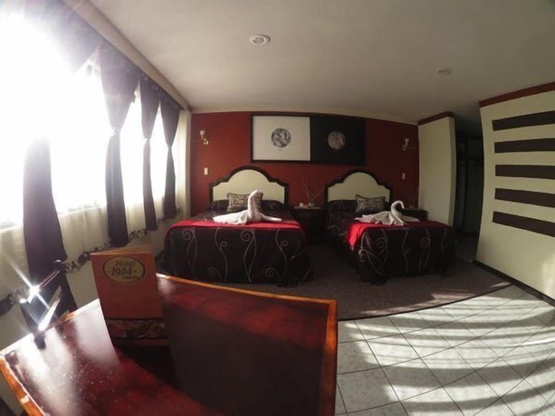 Imagen de la habitación del Hotel 1904. Foto 12