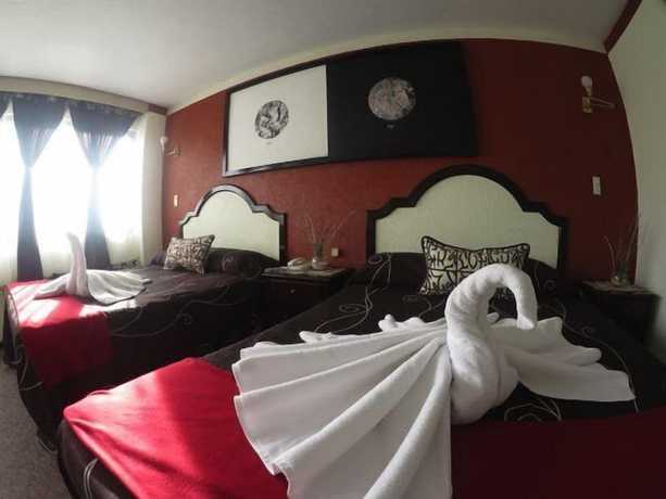 Imagen de la habitación del Hotel 1904. Foto 14