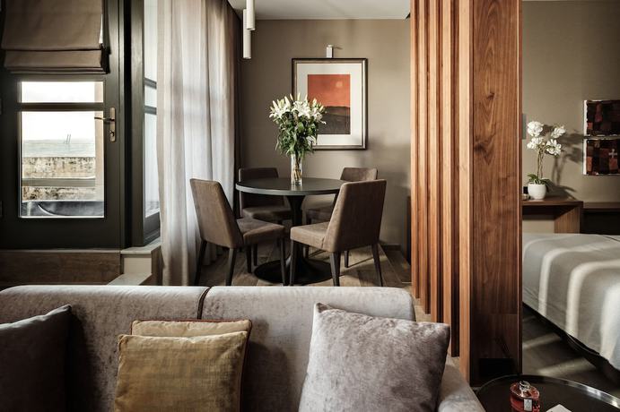 Imagen de la habitación del Hotel 1926 Le Parisot Boutique Suites. Foto 4