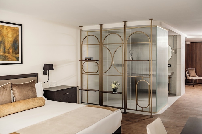 Imagen de la habitación del Hotel 1926 Les Bains Private Spa Suites. Foto 10