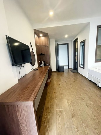 Imagen de la habitación del Hotel 1986's. Foto 4