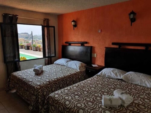 Imagen de la habitación del Hotel 1988 Guanajuato. Foto 3