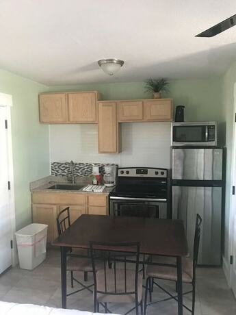 Imagen de la habitación del Hotel 19988 Front Beach Rd. Foto 7