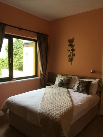 Imagen de la habitación del Hotel 19th Green guesthouse. Foto 16