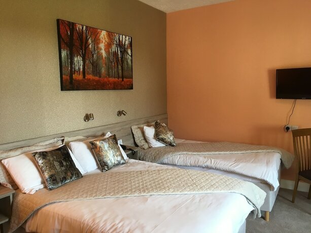 Imagen de la habitación del Hotel 19th Green guesthouse. Foto 17