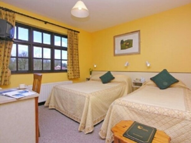 Imagen de la habitación del Hotel 19th Green guesthouse. Foto 20