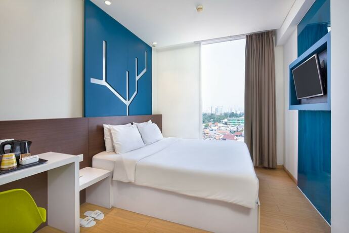 Imagen de la habitación del Hotel 1o1 Urban Jakarta Pemuda. Foto 15