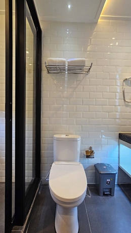 Imagen de la habitación del Hotel 1o1 Urban Jakarta Thamrin. Foto 11