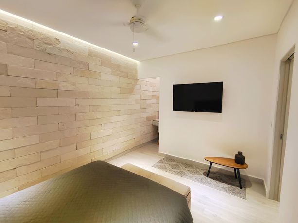 Imagen de la habitación del Hotel 1st Luxury Warehouse. Foto 16