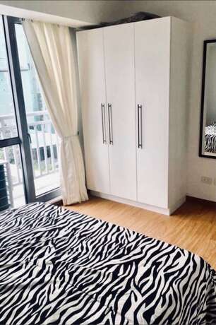 Imagen general del Hotel 2 Bedroom Suite by Nezpril @ Acqua Residence Manila. Foto 14