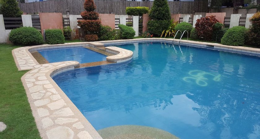 Imagen de la piscina del Hotel 2 Bedroom Villa by AP at Tagaytay Hampton Villa. Foto 19