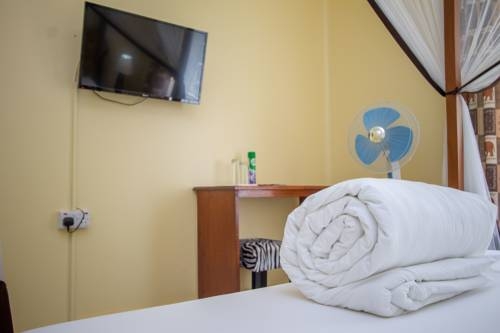 Imagen de la habitación del Hotel 2 Friends Guest House. Foto 7