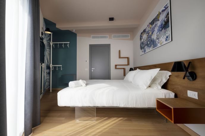 Imagen de la habitación del Hotel 21 House Of Stories Città Studi. Foto 11