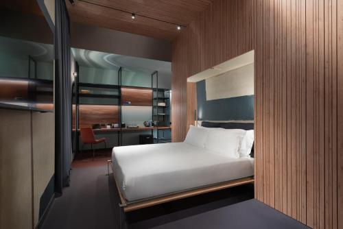 Imagen de la habitación del Hotel 21 House Of Stories Navigli. Foto 13