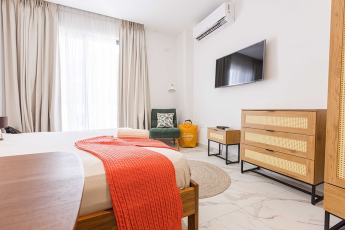 Imagen de la habitación del Hotel 233 Boulevard-Cantonments by Quao Realty. Foto 4