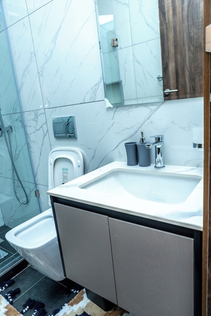 Imagen de la habitación del Hotel 233 Boulevard-Cantonments by Quao Realty. Foto 13