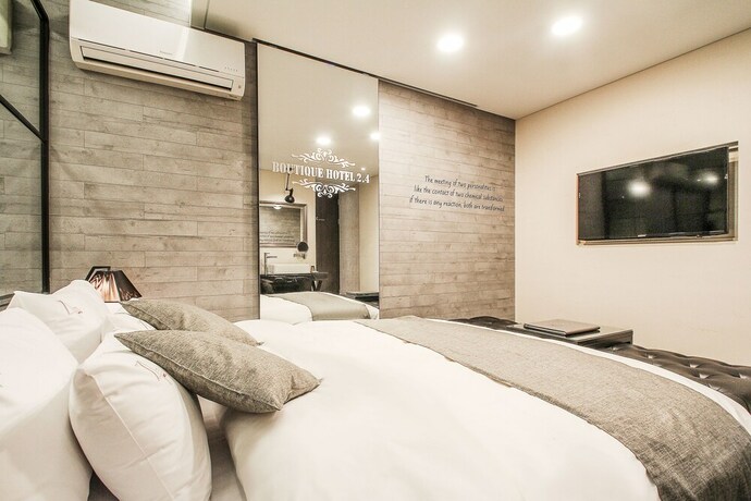 Imagen de la habitación del Hotel 2.4. Foto 27