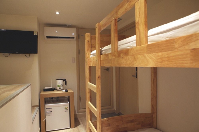 Imagen de la habitación del Hotel 24 Guesthouse Seoul Station Premier. Foto 7