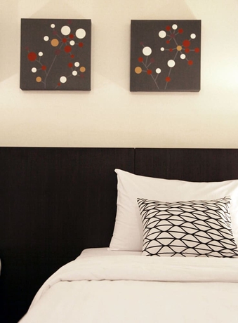Imagen de la habitación del Hotel 24 Inn. Foto 6