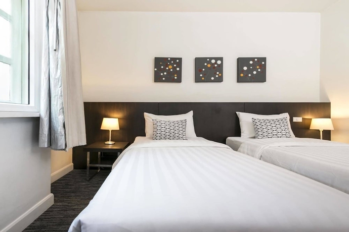 Imagen de la habitación del Hotel 24 Inn. Foto 7
