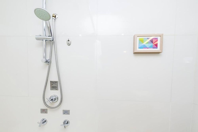 Imagen de la habitación del Hotel 24 Inn. Foto 8