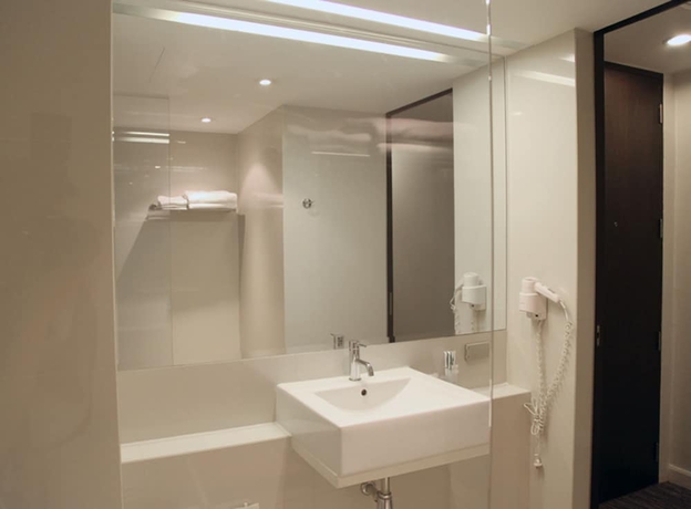Imagen de la habitación del Hotel 24 Inn. Foto 9