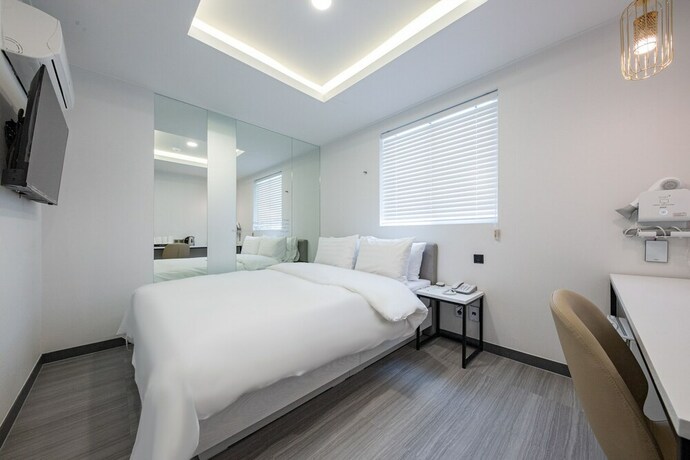 Imagen de la habitación del Hotel 24st Prestige. Foto 12