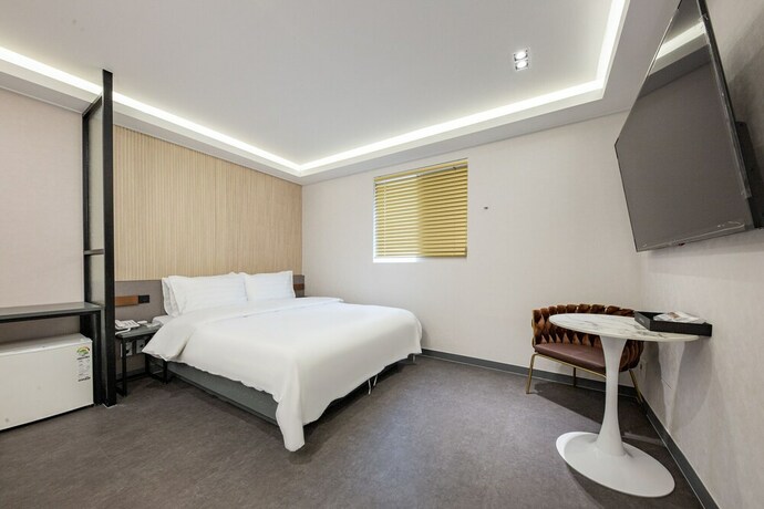 Imagen de la habitación del Hotel 24st Prestige. Foto 18