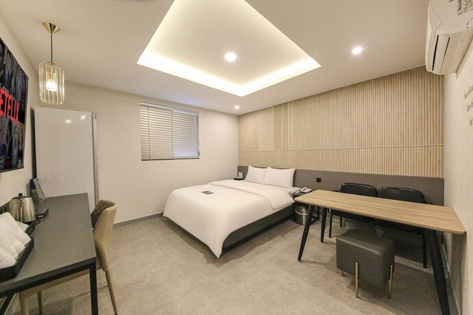 Imagen de la habitación del Hotel 24st Prestige. Foto 32