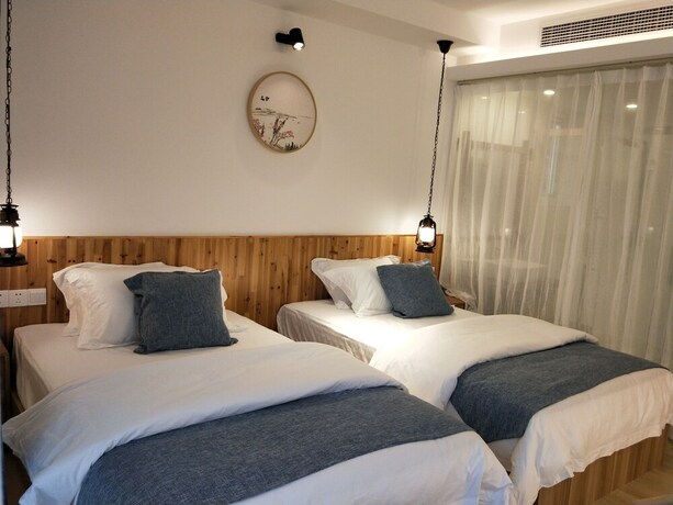 Imagen de la habitación del Hotel 25 Degree Sea Boutique Homestay. Foto 17