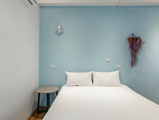 Imagen de la habitación del Hotel 25 Inn Kenting Henchun. Foto 13