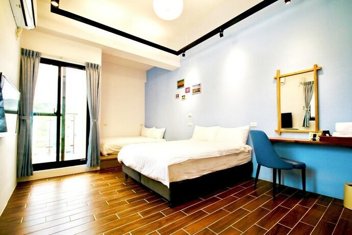 Imagen de la habitación del Hotel 25 Inn Kenting Henchun. Foto 14