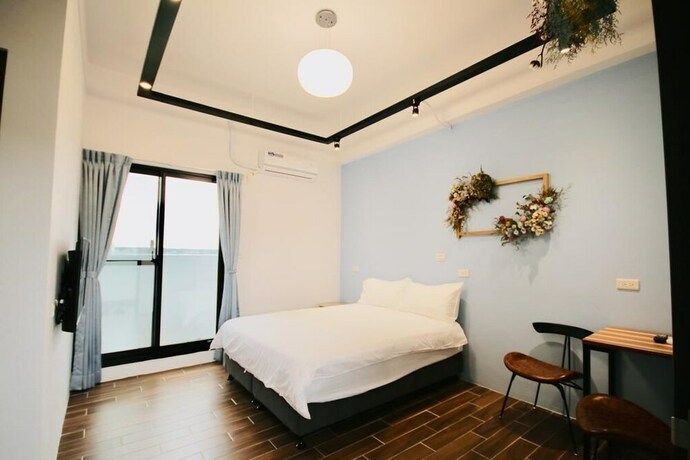 Imagen de la habitación del Hotel 25 Inn Kenting Henchun. Foto 15