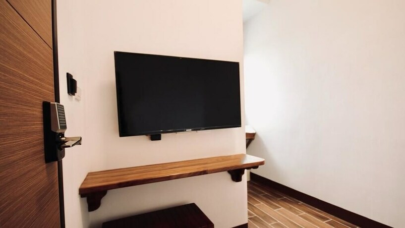 Imagen de la habitación del Hotel 25 Inn Kenting Henchun. Foto 19