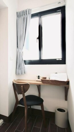 Imagen de la habitación del Hotel 25 Inn Kenting Henchun. Foto 21