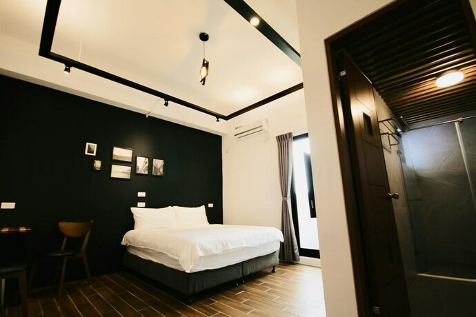 Imagen de la habitación del Hotel 25 Inn Kenting Henchun. Foto 22