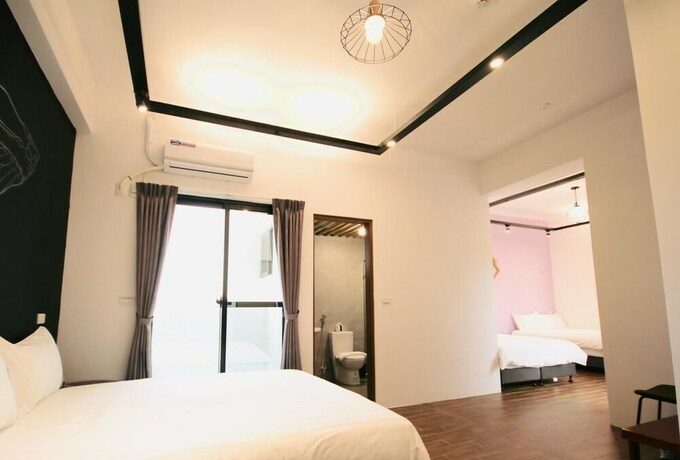 Imagen de la habitación del Hotel 25 Inn Kenting Henchun. Foto 23