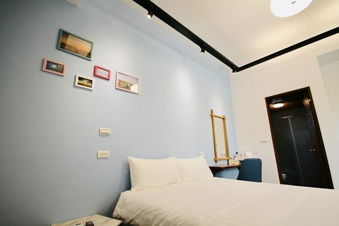 Imagen de la habitación del Hotel 25 Inn Kenting Henchun. Foto 24