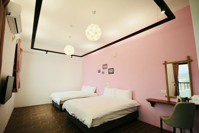 Imagen de la habitación del Hotel 25 Inn Kenting Henchun. Foto 25