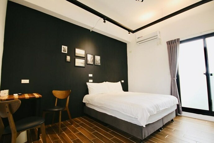 Imagen de la habitación del Hotel 25 Inn Kenting Henchun. Foto 31