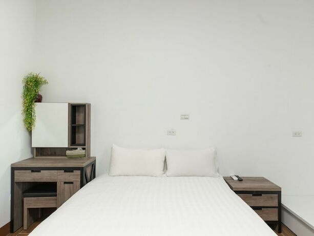 Imagen de la habitación del Hotel 25 Inn Kenting Henchun. Foto 33