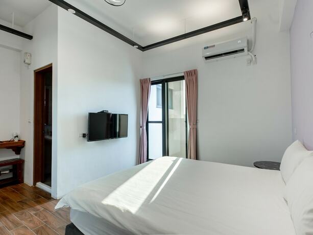 Imagen de la habitación del Hotel 25 Inn Kenting Henchun. Foto 35