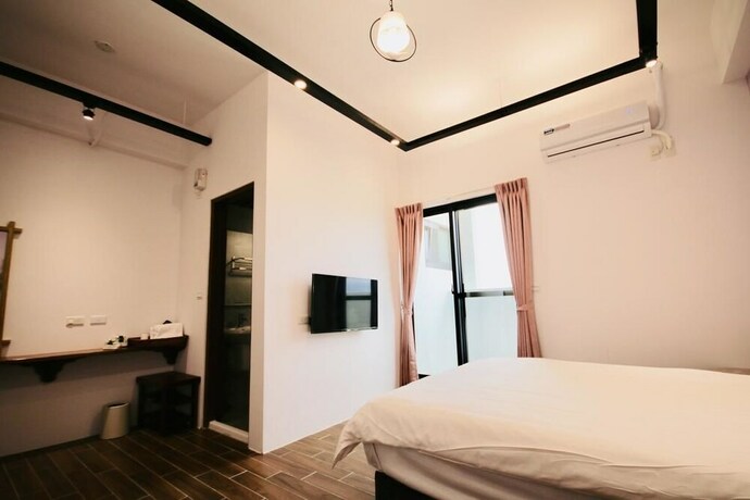 Imagen de la habitación del Hotel 25 Inn Kenting Henchun. Foto 36