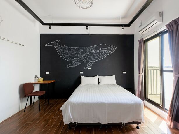 Imagen de la habitación del Hotel 25 Inn Kenting Henchun. Foto 38