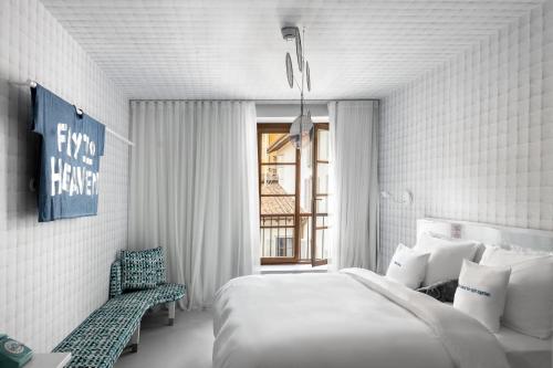 Imagen de la habitación del Hotel 25hours Florence Piazza San Paolino. Foto 12